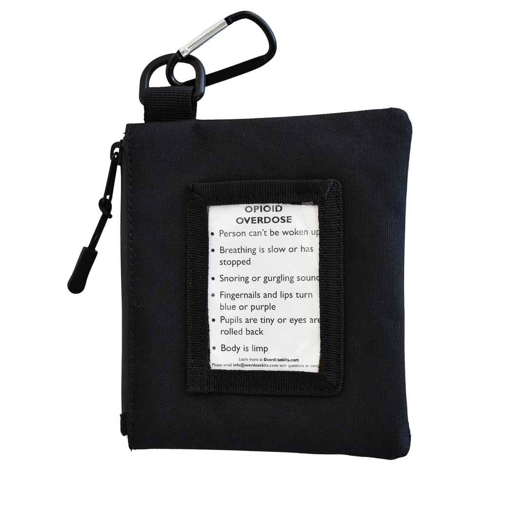 Overdose Kits black canvas pouch with carabiner, includes overdose instructions and test strips. Water-resistant design.