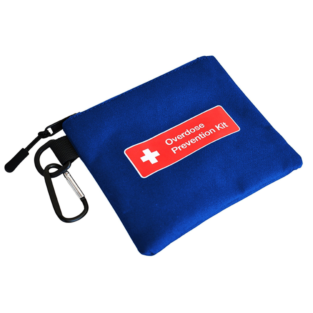 Overdose Kits blue canvas pouch with red "Overdose Prevention Kit" label and carabiner clip