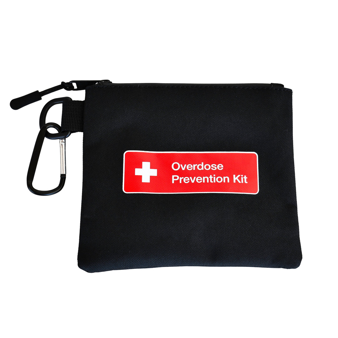 Overdose Kits black canvas pouch with red "Overdose Prevention Kit" label, zipper, and carabiner clip.