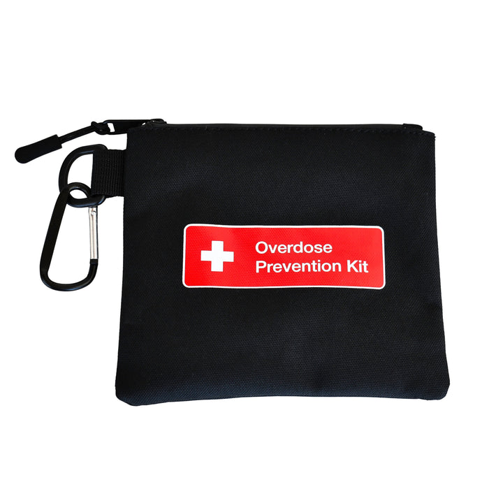 Overdose Kits black canvas pouch with red "Overdose Prevention Kit" label, zipper, and carabiner clip.