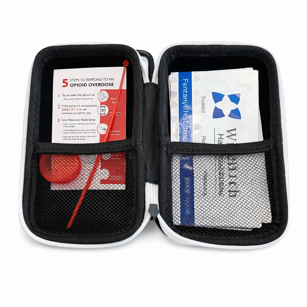 Durable carbon fiber hardshell case shown with its internal components, including Fentanyl test strips and mixing tools. Designed for secure storage and rapid transport of essential harm reduction supplies in emergency overdose situations.